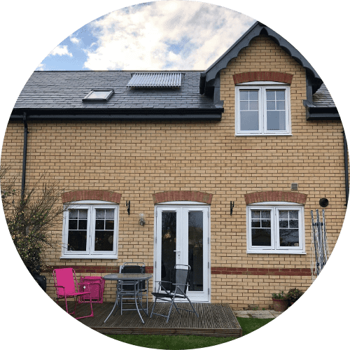 an image of an extention with french doors and a new decking